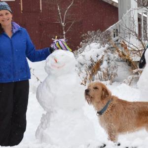 Lucy and Beth Ward, with their snow sculptures, after a heavy 2018 snowfall. (Photo by Lynda Clancy)