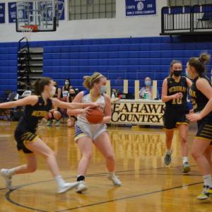 Boothbay Region point guard Kylie Brown looks for an open teammate Feb. 15 during the team’s 42-33 loss in high school girls’ action. BILL PEARSON/Boothbay Register