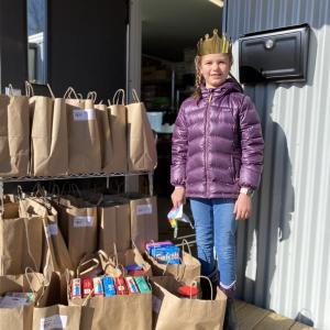 Addie Blake delivering birthday cake supplies to AIO on her 10th birthday. (Photo courtesy AIO Food and Energy Assistance)