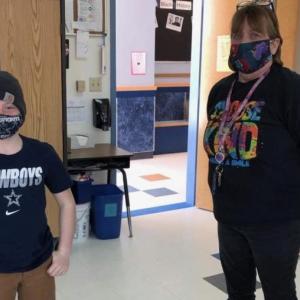 Author Brody Ingraham, left, talks with Barbara Kenney of the kitchen staff at Capt. Albert Stevens School. (Photo courtesy Nancy Nickerson)