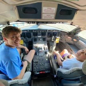 Little Brother Jacoby Joseph and his Big Brother Henry Morjikian reunite for the first time in over a year at a Big Brothers Big Sisters of Mid-Maine fundraising event at Elite Airways. (Photo courtesy Big Brothers Big Sisters of Mid-Maine)