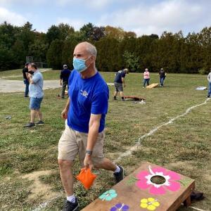 Sandy Cox participating in a cornhole event in September 2020. (Courtesy photo)