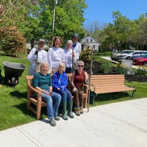 Doug and Pat Cole, Sally Cook, Jan Baldwin, Paula Coyne, Denise Munger and Haunani Wallace put finishing touches on Memorial Park, across the street from the new Rockport Public Library.