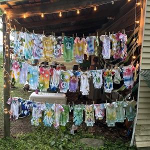 Tiny onesies, tie-dyed by the guests at a summer baby shower.
Photo by Morgan Keating onesies