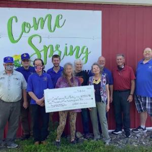 L to R: Dale Flint, Edgar Moody, Frank Nelson, Tristan Gagne, Tracy Spaulding, Sarah Drickey, Jaine Jacobs, Gary Roberts, Bill Lombardi and Joshua Smith. Missing from the photo is Come Spring Board member Lorain Francis. (Photo by John Jensen)