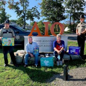 (Left to Right) Deputy Juan J. Alcala, Joe Ryan, Vera Roberts, Sheriff Timothy K. Carroll. (Photo courtesy AIO)