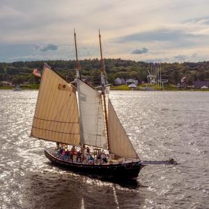 The Mary E schooner sailing on the Kennebec River in 2019. (File photo courtesy of the Maine Maritime Museum)
