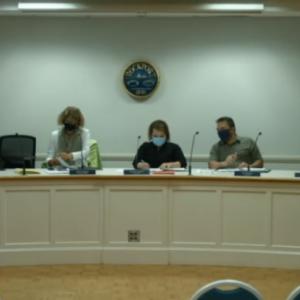 Town Manager Jon Duke, left, and members of the Rockport Select Board meet Oct. 12 at the Rockport Opera House. Source: Livestream