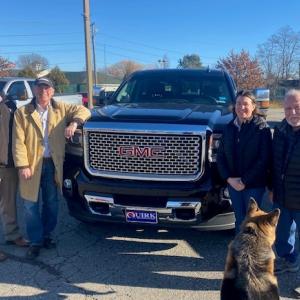 L to R: Joe Quirk and his father, Jack Quirk; Tammy Kolmosky and her father, Ed Kolmosky. Jack Quirk, along with his brothers Bob, Jim, Tom and Dave have purchased Fuller Chevrolet-GMC from the Kolmosky family. (Photo courtesy the Kolmosky family)