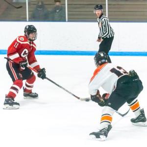 Camden Hills Jacob Johnson, (11) works his way past Brewer's Brady Barker to score the game winner in overtime. Camden Hills won 2-1. (Photo by Ron Hawkes/MSR)