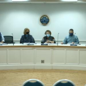 Rockport Town Manager Jon Duke, left, and members of the Select Board meet Dec. 13 at the Rockport Opera House.