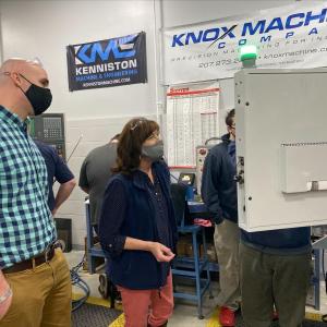 Maine Education Commissioner Pender Makin (center) and Bobby Deetjen, director of Mid-Coast School of Technology visit a class at the school. (Photo courtesy Maine Department of Education)