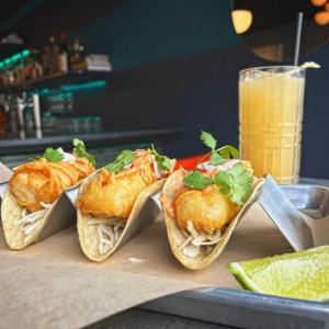 Beer-battered fried cod tacos with chipotle mayo, cabbage, radish and cilantro. Photo courtesy Hey Sailor