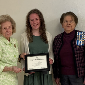 Joyce Davies, vice-regent, presents certificate to Isabel Danforth, Midcoast School of Technology, as Joanne Richards, regent of Lady Knox, looks on. (Photo courtesy Lady Knox Chapter)