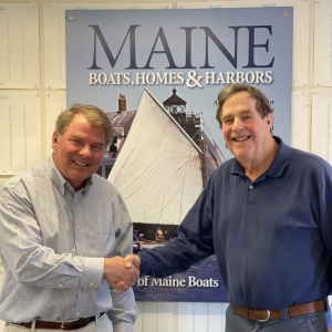 New owner and publisher Ted Ruegg and MBH&H founder and publisher, John K. Hanson Jr.