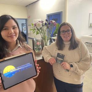 BAHS junior Erin Faith Fuller and her logo entry with BAHS assistant principal Jessica Woods. Woods is also one of the Marine Institute's coordinating team members. (Photo courtesy Charles Lagerbom)