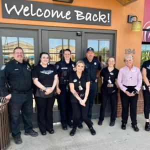 Rockland Chief Neal, Officer Pritchette, Officer Peasley and Applebee's management and staff. (Photo courtesy Troy Peasley)