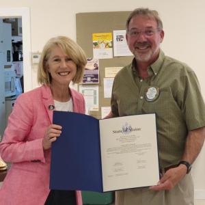 Maine State Representative Vicki Doudera presents a Spirit of America Foundation Award to Camden Rotary Club President Jonathan Goss in recognition of the club's extensive record of community service. (Photo courtesy Camden Rotary Club)