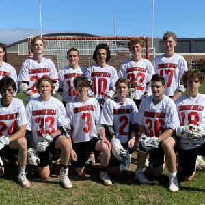 The 14 seniors of the Camden Hills boys lacrosse team. Back row, from left, are Cole Freeman, Eben Fagonde, Vanya Perevalov, Jackson Fitch, Willy Doehla and Logan Odone. Front row, from left, are Elias Libby, Owen Cooper, Rory Carlson, Alex Kurzius, Christopher Cammelieri and Camden Powell. (Photo by Victoria Marshall.)