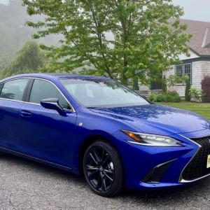 Along with a firmer suspension, the F Sport package includes black wheels and grille inserts, a distinctive front bumper and special badges. This color is Ultrasonic Blue Mica; in silver, the ES looks quite elegant.