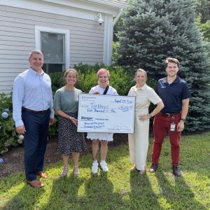 The presentation of the Trekkers, Inc., grant check. (Photo courtesy Bangor Savings Bank)