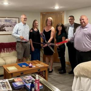 Rachel Glaser, owner and practitioner, (holding the scissors) along with (L to R) Sandy Cox, Julie Brooks, Janet Bouchard; Eric Belley and Chris Austin. (Photo courtesy Rachel Glaser)
