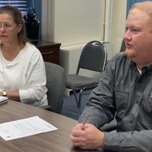 During the Oct. 18 commissioners’ meeting, Lincoln County Emergency Management Agency Director Casey Stevens, right, describes a regional emergency plan for a possible energy shortage this winter. BILL PEARSON/Boothbay Register