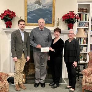 L to R: Matthew Mainster, director of Choral Bells; Rich Norman, Supervisor of St. Bernard Soup Kitchen; Amy Rollins, concert organizer; and Debra Hall, President of Penobscot Bay Ringers. (Photo courtesy Amy Rollins)