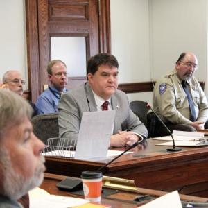 Sen. Curry answers questions from lawmakers on the Criminal Justice and Public Safety Committee.