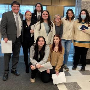 Sen. Curry (second from left) and legislative staff (right) with students from BCOPE after the public hearing on LD 752.
