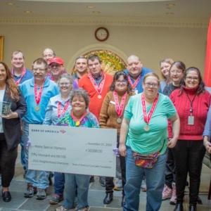 Left to right – unless otherwise noted, individual is a Bank of America employee and Special Olympics athlete: Brian King, President, Bank of America Maine; Peter Moody of Belfast, Maine; Lisa Bird, Special Olympics Maine; John Paul Carr of Belfast, Maine; Jared Stewart of Rockland, Maine; Bill King of Stockton, Maine; Ken MacLeod; Daisy Curtis of Belfast, Maine; Margi Stearns of Belfast, Maine; Frank Carr of Searsmont, Maine; Kurt Leidenroth of Thomaston, Maine; Patricia Saucier of Searsport, Maine; Dan Rancourt of Rockland, Maine; Sherri Carr of Belfast, Maine; Caitlin Munroe of Rockport, Maine; Anna Strout of Searsport, Maine; Latricia Saucier of Searsport, Maine; Mary Tripp, Belfast Site Leader, Bank of America; and Brian Bragg, Support Services Department Manager, Bank of America. (Photo courtesy Bank of America)