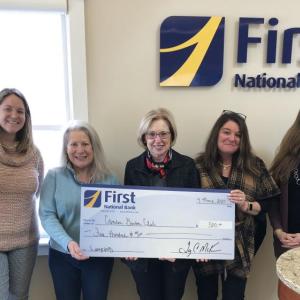 Leaders of First National Bank and First National Wealth Management present a check for first two sponsored lampposts to leaders of the Camden Garden Club. (Photo courtesy Camden Garden Club)