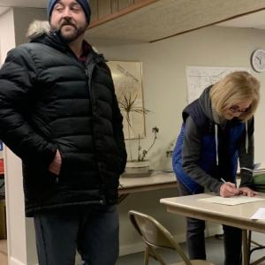 Michael Maxim of Edgecomb waits as Barbara Brennan signs his nomination papers for selectman. Maxim is not running in the April 15 special election. He is running for a full term during the May municipal election. Maxim attended the March 7 select board meeting and budget hearing. BILL PEARSON/Boothbay Register
