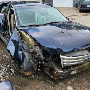 Camden firefighters removed doors from the sedan to help extricate the driver after his vehicle landed in a Route 1 ditch Monday afternoon, April 17. The car was transported by Camden Exxon to the Rockport garage. (Photo courtesy Camden Fire Dept.)