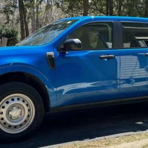 The Maverick XL is a midsize, front-wheel-drive hybrid pickup that is refreshingly focused on utilitarian truck-ness. Note no break between the cab and the bed: This is a unibody chassis shared with the also excellent Ford Bronco Sport.