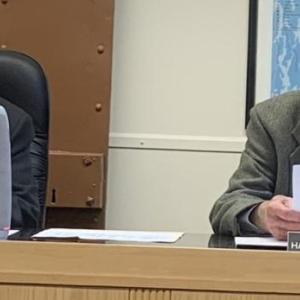 Lincoln County Commissioners Bill Blodgett, left, and Hamilton Meserve review vehicle bids for the sheriff’s department during the April 18 meeting. BILL PEARSON/Boothbay Register