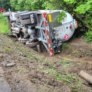 An Irving Oil tanker landed on its side, off of Route 1, causing midday traffic delays. (Photo from Belfast Fire and EMS Facebook, posted with permission)