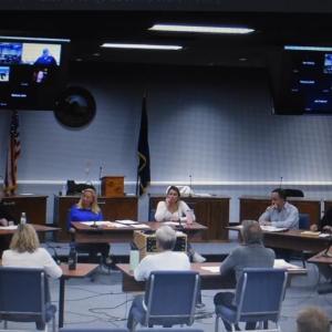 Facing the camera, left to right: Councilors Sarah Austin and Penny York sit with Mayor Louise MacLellan-Ruf and Councilors Nicole Kalloch and Adam Lachman.