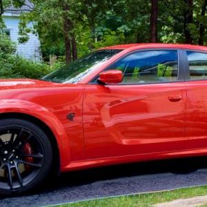 Especially in beefed-up Widebody trim, the Hellcat is a large car. What would it be like as a more-nimble two-seat coupe? Then we’d have another berserk Dodge, the Viper, discontinued in 2017 because it couldn’t fit side-curtain airbags. This color is Go Mango. It certainly is.