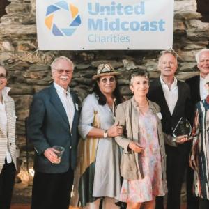 John Tuton, Lucy Wolf Tuton; Jim Hengerer, UMC Board Chair, Alexa Fogel, Marya Flanagan, Judson Flanagan; John Viehman, UMC President; Dennie Wolf and Thomas Wolf. (Photo courtesy United Midcoast Charities)