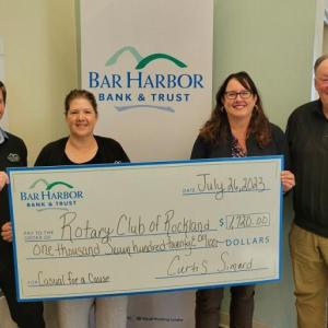 Bar Harbor Bank & Trust (BHBT) presents a donation from the Bank’s Casual for a Cause program to Rotary Club of Rockland. Pictured from left to right: Nathan Wyman, Personal Banker at BHBT; Becky French, AVP Branch Relationship Manager at BHBT; Susan W. Page, Playground Fundraising Chair for Rotary Club of Rockland; and Kirmet Voncannon, Jr., Former President of Rotary Club of Rockland. (Photo courtesy Bar Harbor Bank & Trust)