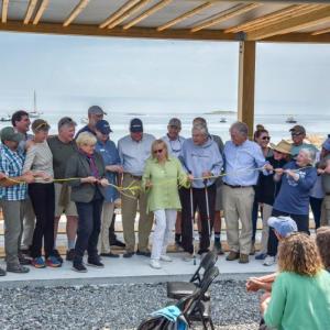 Maine Congresswoman Chellie Pingree and Gov. Janet Mills (center) cut the ribbon on the new Hurricane Island Field Research Station Aug. 5. (Photo courtesy Nate Hathaway)