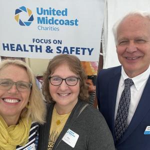 Finding Our Voices has brought on its first paid, full-time staff member in Mary Kamradt, with help from a $7,500 grant from United Midcoast Charities. From left to right, McLean, Kamradt, and John Viehman, executive director of United Midcoast Charities. (Photo by Patrisha McLean)