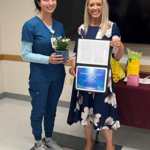 Emily Evans, RN (left), receives a Standing Ovation Award from Denise Needham, PharmD, president of Pen Bay Medical Center and Waldo County General Hospital, during an employee award ceremony held Aug. 29 at WCGH. (Photo courtesy Waldo County General Hospital)