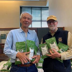 Camden Rotarians Bob Baldwin and Tom Pine prepare for holiday nut sales in local banks, the Penobscot Bay YMCA, and downtown Camden. (Photo courtesy Camden Rotary Club)