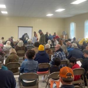 The scene at the Community Building for an informational meeting about the town’s options in response to the proposed building. (Photo by Ed O’Brien)