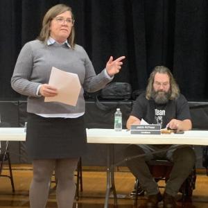 Wiscasset Superintendent Kim Andersson read a memo listing reasons why she recommends middle and high school Principal Gina Stevens should be dismissed during a Nov. 13 special committee hearing held in public. BILL PEARSON/Boothbay Register