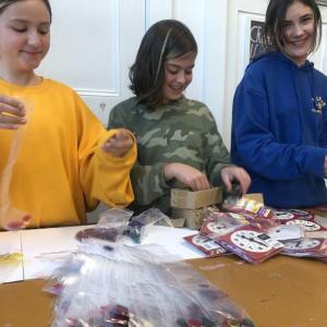 Waterfall Arts game makers prepare kits. (Photo courtesy Waterfall Arts)