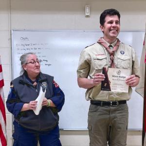 Karen Norton presented Jared Todd with his certificate. (Photo courtesy Chuck Mahaleris)