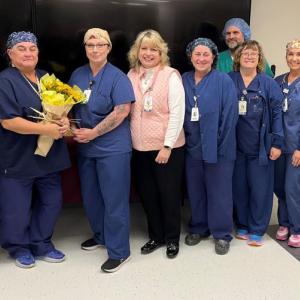 Waldo County General Hospital Perioperative Services Coordinator Sandra Hayes receives the hospital’s Sunshine Award, surrounded by members of her team. Pictured from left: Ellen Leone, MSN,
RN, chief nursing officer; Hayes; Niki Arlen, surgical technologist, Waldo OR; Nancy Akers, Waldo perioperative nurse manager; Tracy Medina, surgical technologist, Waldo OR; Bryan Sirois, certified surgical technologist, Waldo OR (back); Denise Keller, RN, Waldo OR; Vanessa Mckay, clinical care coordinator, Waldo OR; and Denise Needham, PharmD, president. (Photo courtesy Waldo County General Hospital0